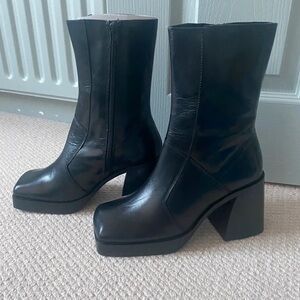 Elegant Black Heeled Boots